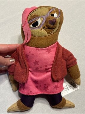 Disney Zootopia Priscilla Sloth Plush with Purple Leggings and Rust Cardigan